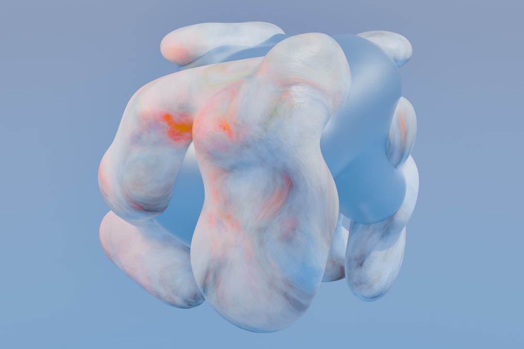 A pair of hands holding something in the air